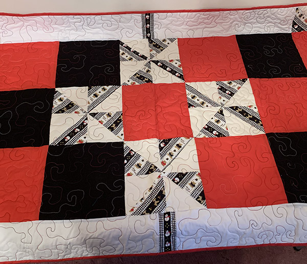 Heirloom Quilt in red, white and black colors